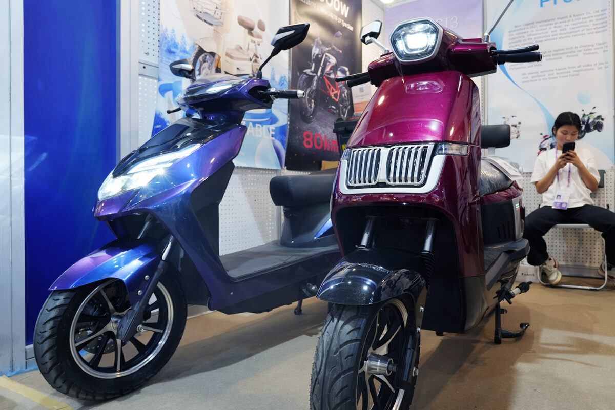 Legend EV delivery electric scooter uses a rear cargo box and a front footboard cargo area to improve courier efficiency