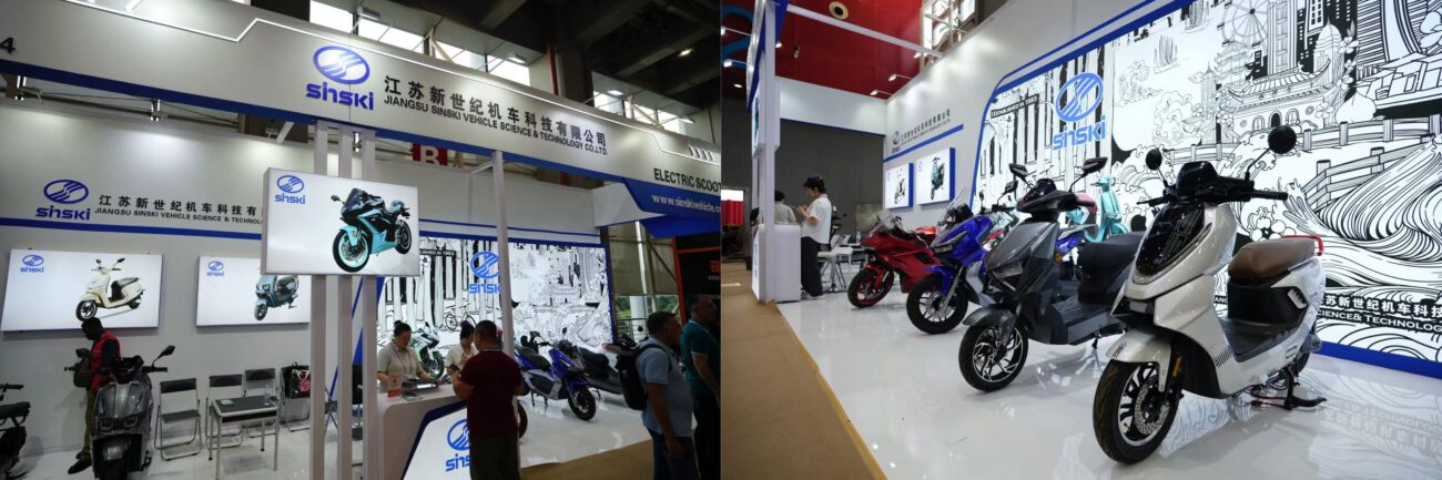 SINSKI booth with street-legal e-scooters and a lead model for comparison