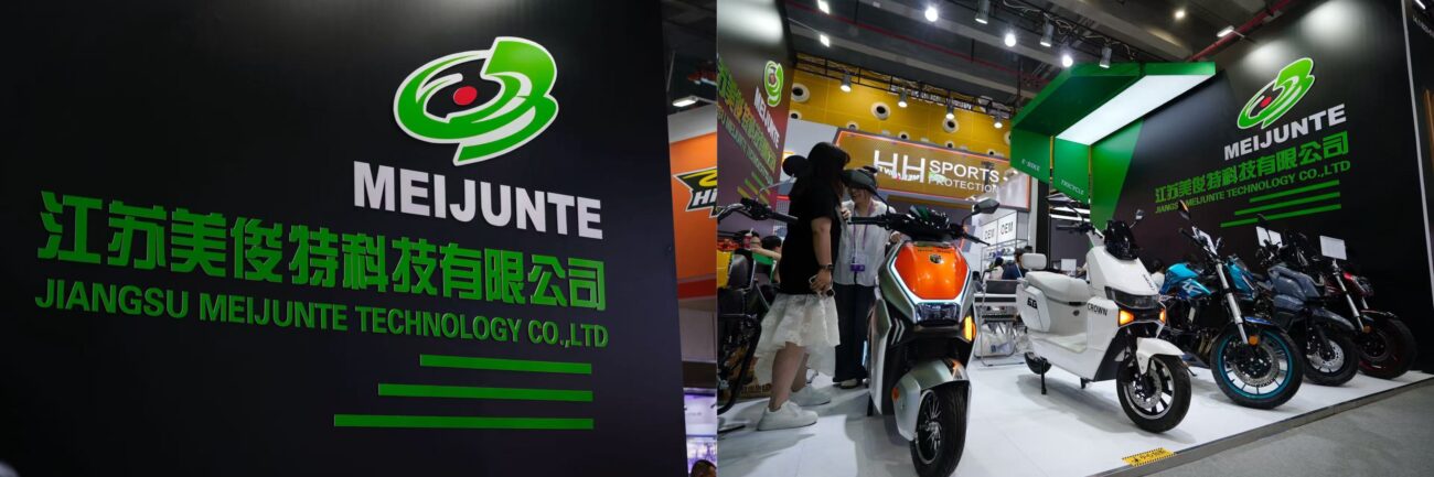 Meijunte Technology booth featuring components with a demo scooter