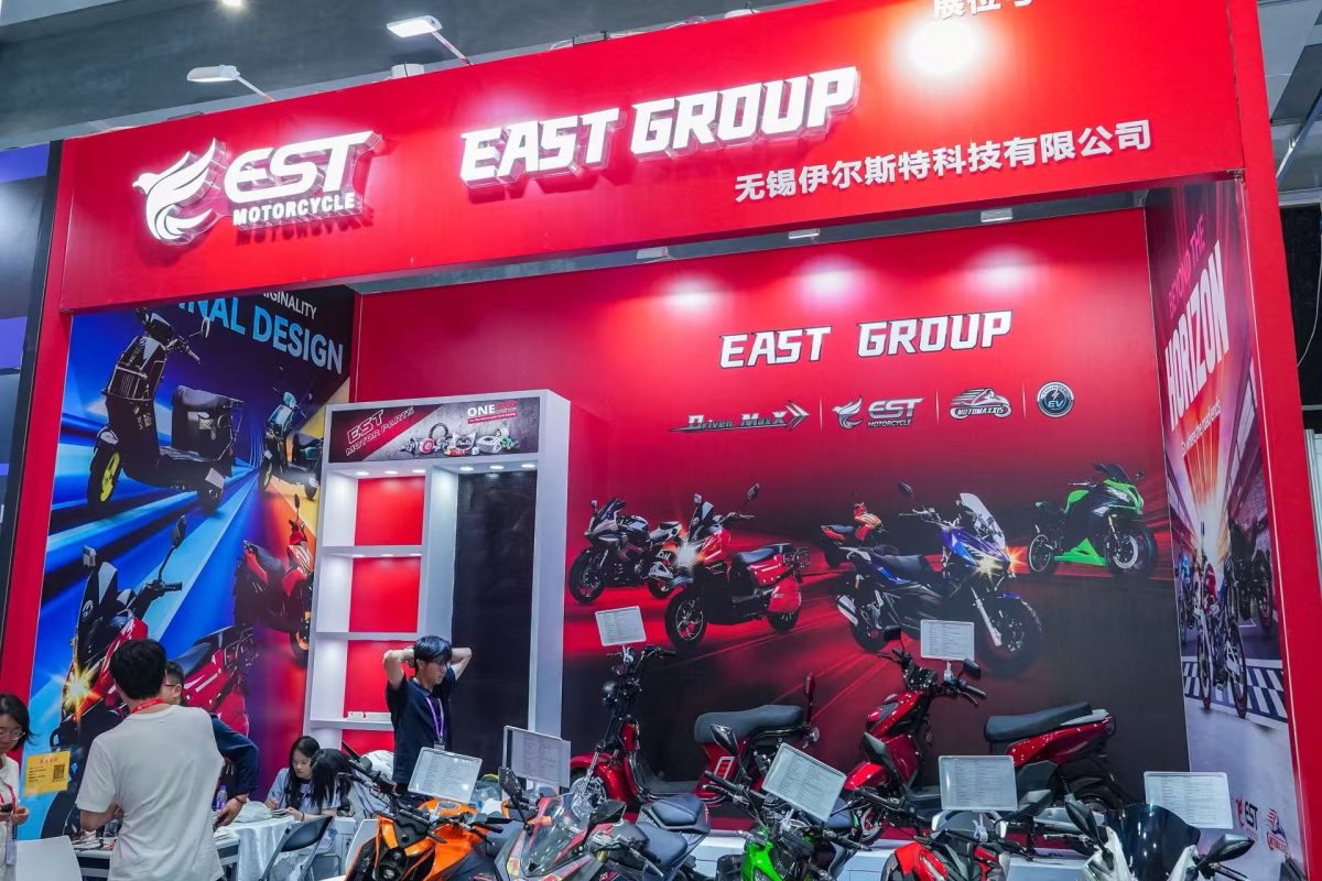 East Group booth at the 139th Canton Fair displaying motorcycles and electric scooters